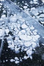 Bubbles in ice. Baikal lake. Winter texture Royalty Free Stock Photo