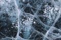 Bubbles in ice on Baikal lake in winter, snow landscape Royalty Free Stock Photo
