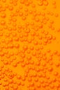 Bubbles in orange soda