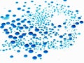 Bubbles of paint on white background, abstract pattern of blue ink. Random drop. Royalty Free Stock Photo