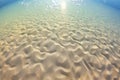 bubbles rising against sand ripple undercurrents