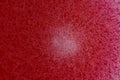 Bubbles on the surface of the drink of red raspberries soda drink on background. Fresh drink of scarlet cranberry or cherry or red Royalty Free Stock Photo