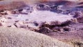 Bubbling and Dried Cracked Mud in Fountain Paint Pot Geyser in Yellowstone National Park Royalty Free Stock Photo