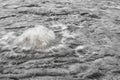 Bubbling pool of motion water in park