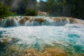 Bubbling turquoise water in the waterfall Agua Azul, Chiapas, Palenque, Mexico Royalty Free Stock Photo