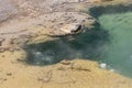 Bubbling Water in a Colorful Hot Spring Royalty Free Stock Photo