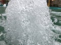 The bubbling water in the fountain. lots of bubbles, blue water Royalty Free Stock Photo