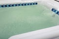 bubbling water in hot jacuzzi close up, spa background, copy space Royalty Free Stock Photo