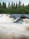 Bubbling waterfall with stone