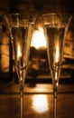 Bubbly champagne by the fire Royalty Free Stock Photo
