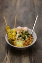 Bubur ayam, an Indonesian chicken congee. breakfast staple. Royalty Free Stock Photo