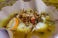 Bubur ayam - Indonesian chicken congee. Royalty Free Stock Photo