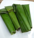 Bubur Lolos, Indonesian Sundanese Glutinous Rice Porridge Wrapped in Banana Leaf Royalty Free Stock Photo