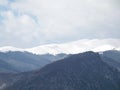 Bucegi Mountain covered with snow in a cloudy day