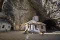 Church at the entrance of Ialomita Cave in Bucegi mountains, Romania Royalty Free Stock Photo