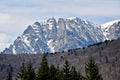 Bucegi mountains in winter with the Heroes Cross on Caraiman Pea Royalty Free Stock Photo