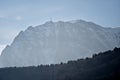 Bucegi mountains in winter with the Heroes Cross on Caraiman Pea Royalty Free Stock Photo