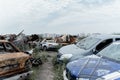 Bucha 15,07,2022, a lot of burnt shelled cars in the parking lot, the consequences of the invasion of the Russian army in Ukraine