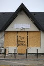 Destroyed market shop after russian army invasion, inscription says that there are no products left inside