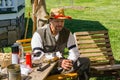 A Male Reenactor With a Hat Relaxing at the Confederate Encampment Royalty Free Stock Photo