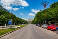 Bucharest center. Unirii boulevard on a sunny summer day. Parliament Palace in the distance. People`s House. Royalty Free Stock Photo