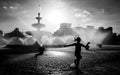 Bucharest central fountain on a hot summer day with children having fun