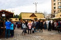 Bucharest Christmas market in front of the Palace of Parliament, Christmas tree, lights, people wandering at the Christmas market