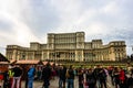 Bucharest Christmas market in front of the Palace of Parliament, Christmas tree, lights, people wandering at the Christmas market