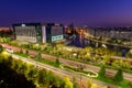 Bucharest city centre skyline at blue hour , national library and Dambovita river