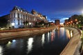 Bucharest courthouse at sundown looking over Dambovita river Royalty Free Stock Photo