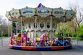 Bucharest, Romania - 24 April 2021: Colourful children colorful carousel with mixed plastic and metallic toys and materials in