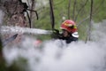 Firefighters using water hoses to extinguish a fire