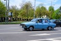 Bucharest, Romania, 24 April 2021 Old retro vivid blue Romanian Dacia 1310 classic car in traffic in a street in a sunny spring