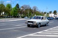 Bucharest, Romania, 24 April 2021 Old retro white Romanian Dacia 1310 classic car in traffic in a street in a sunny spring day