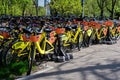 Bucharest, Romania, 24 April 2021: Public bike sharing bicycles from iVelo, Sixt and Raiffeisen Bank in a docking station, Royalty Free Stock Photo