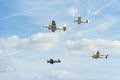 The Flying Bulls Fleet war aircrafts flying against blue sky