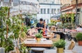 B Outdoor restaurant cafe in old town center of Bucharest. Waiter taking the order from the