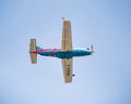 A single-engine turboprop airplane Daher TBM-960 flayingagainst blue sky