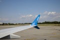 BUCHAREST, ROMANIA - CIRCA 2022: Close View logo of Fly Dubai on wing of aircraft. View from airplane window preparing for takeoff