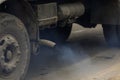 Details with the exhaust pipe of an old truck producing heavy smoke Royalty Free Stock Photo