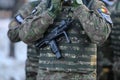 Details with the uniform of a Romanian Military Police soldier, armed with a Micro Uzi