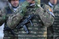 Details with the uniform of a Romanian Military Police soldier, armed with a Micro Uzi