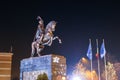 The statue of Michael the Brave illuminated by night, in Bucharest