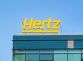 Hertz car rental company logo on an office building in Bucharest. offices in Romania Royalty Free Stock Photo