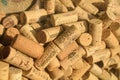 Bucharest, Romania, 2 January 2022: Glass bowl full of many used wine corks from a variety of wineries