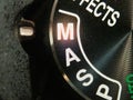 Bucharest / Romania - July 24, 2019: Macro of a Nikon DSLR camera mode dial turned on manual mode Royalty Free Stock Photo