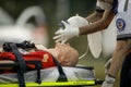 Paramedics perform CPR to a plastic dummy during a public demonstration on how to save a victim Royalty Free Stock Photo