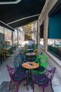 BUCHAREST, ROMANIA - 27 JULY, 2019: Restaurants at the Macca Villacrosse Passage - a fork-shaped, yellow glass covered arcaded