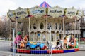 Bucharest, Romania - 20 March 2021: Colourful children colorful carousel with mixed plastic and metallic toys and materials in