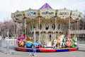 Bucharest, Romania - 20 March 2021: Colourful children colorful carousel with mixed plastic and metallic toys and materials in